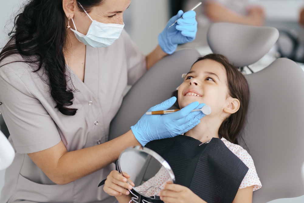 little-beautiful-girl-dentist-smiling | Studio Smiles little-beautiful-girl-dentist-smiling